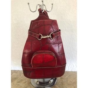 \limited edition Vtg DOONEY and BOURKE deep red Pyramid alto sling mini backpack